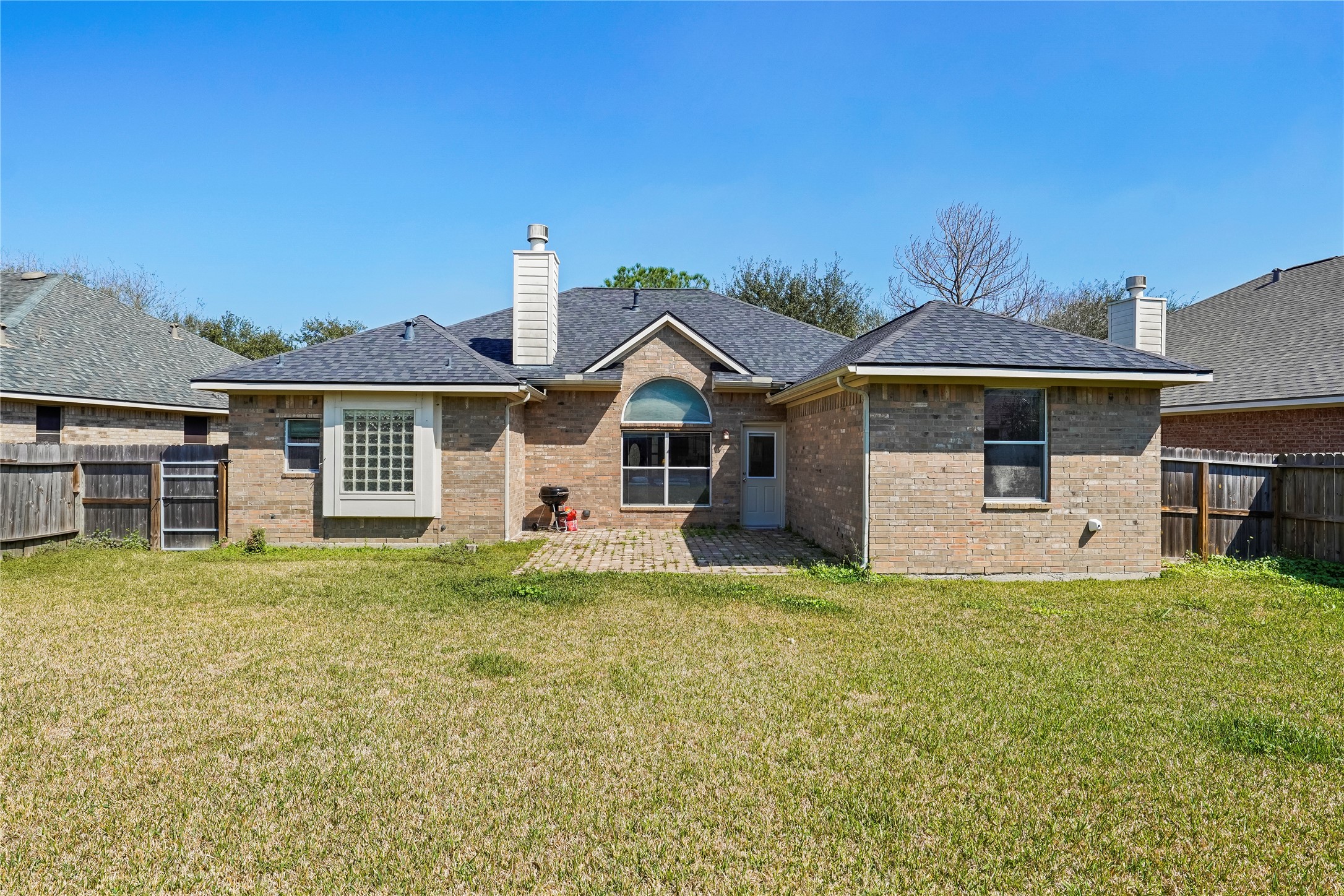5710 Shady Hollow Court Rosharon, TX 77583 - Photo 2 of 25 a front view of a house with a yard