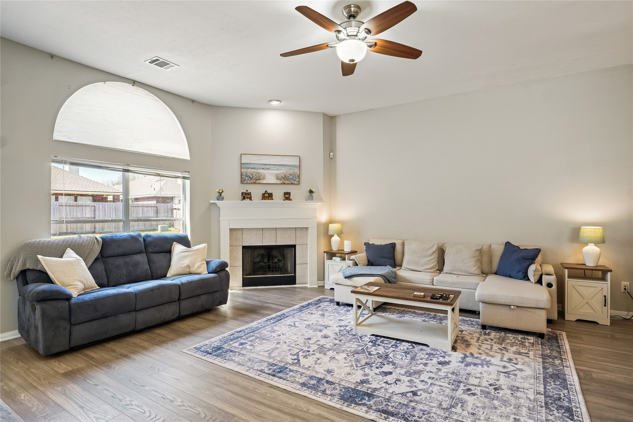 5710 Shady Hollow Court Rosharon, TX 77583 - Photo 6 of 25 a living room with furniture and a fireplace