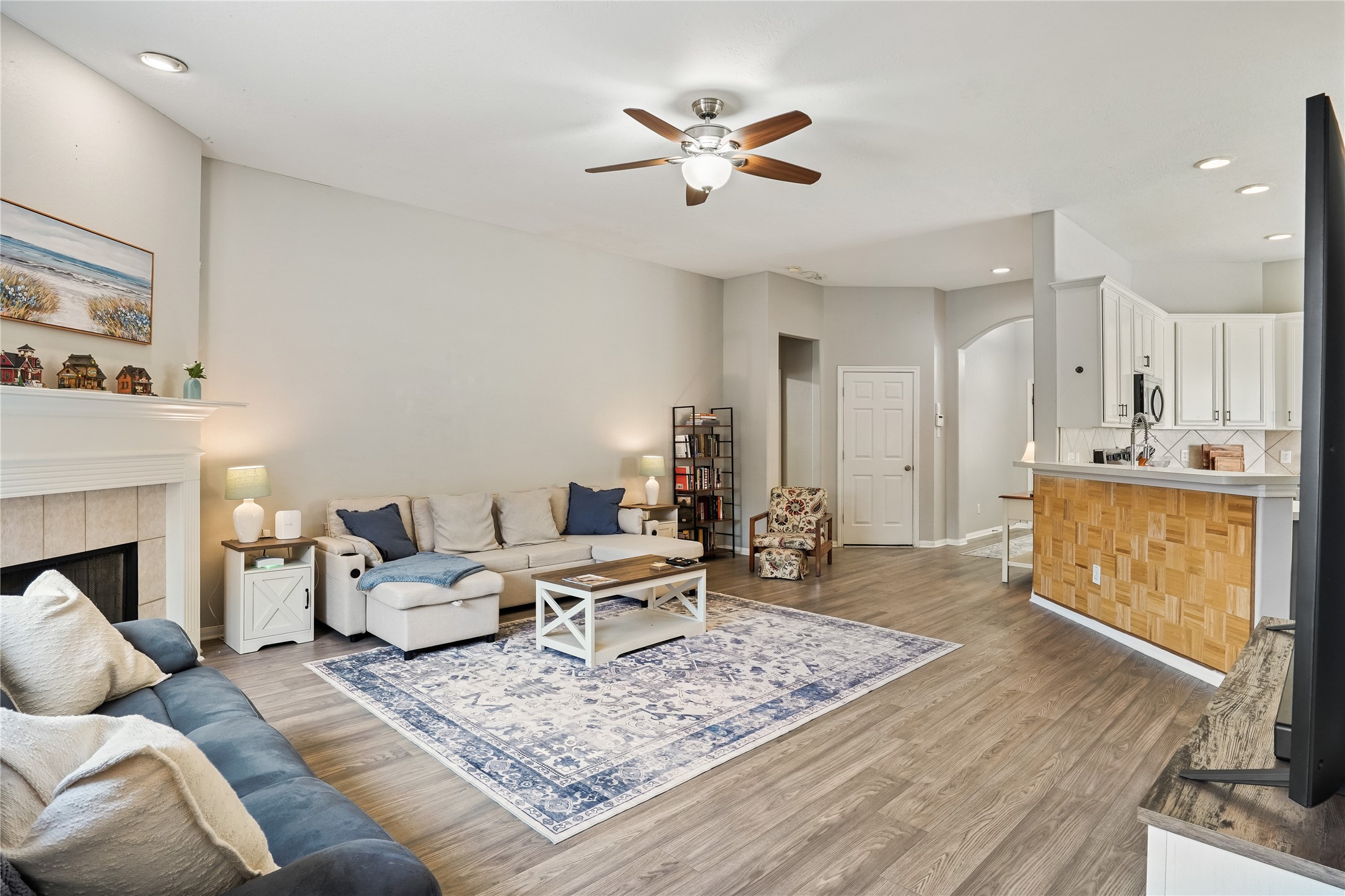 5710 Shady Hollow Court Rosharon, TX 77583 - Photo 7 of 25 a living room with furniture and a fireplace