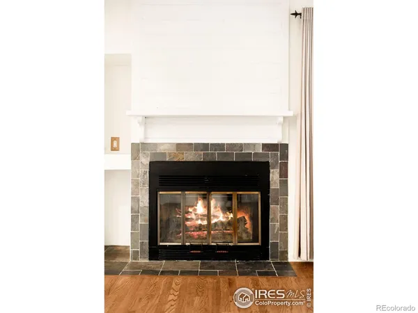 a living room with a fireplace