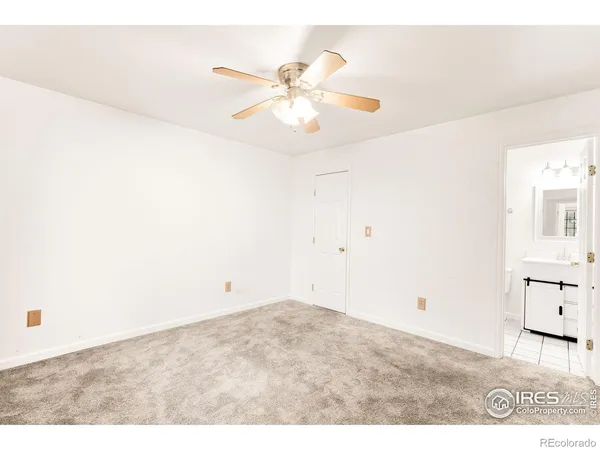 a bathroom with a sink vanity and a mirror