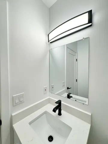 a bathroom with a sink and a tub