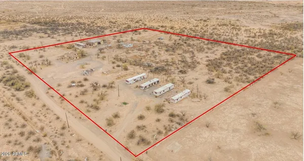 a view of a road with a building in the background