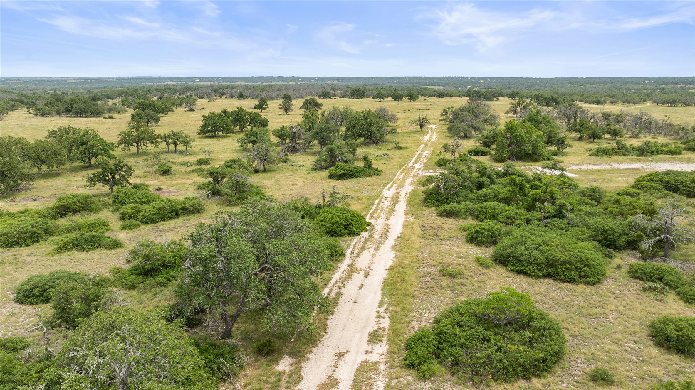 3049 Reservation Road Harper, TX 78631 - Photo 16 of 40 a view of an outdoor space and a yard