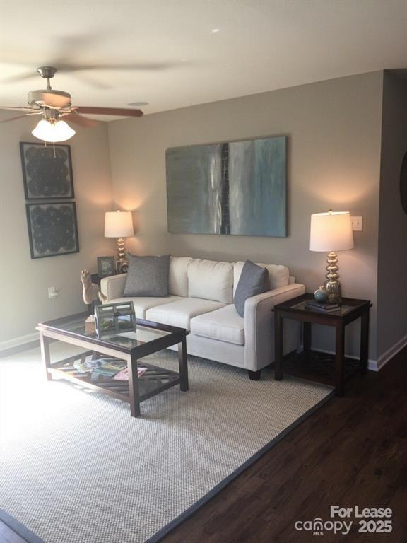 4208 Long Arrow Drive Concord, NC 28025 - Photo 2 of 12 a living room with furniture and a lamp