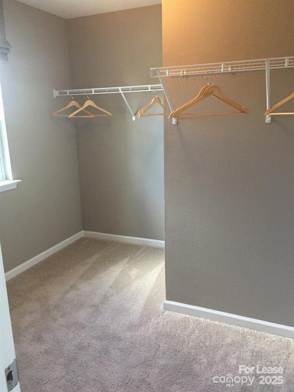 4208 Long Arrow Drive Concord, NC 28025 - Photo 9 of 12 a view of small space with racks on the wall