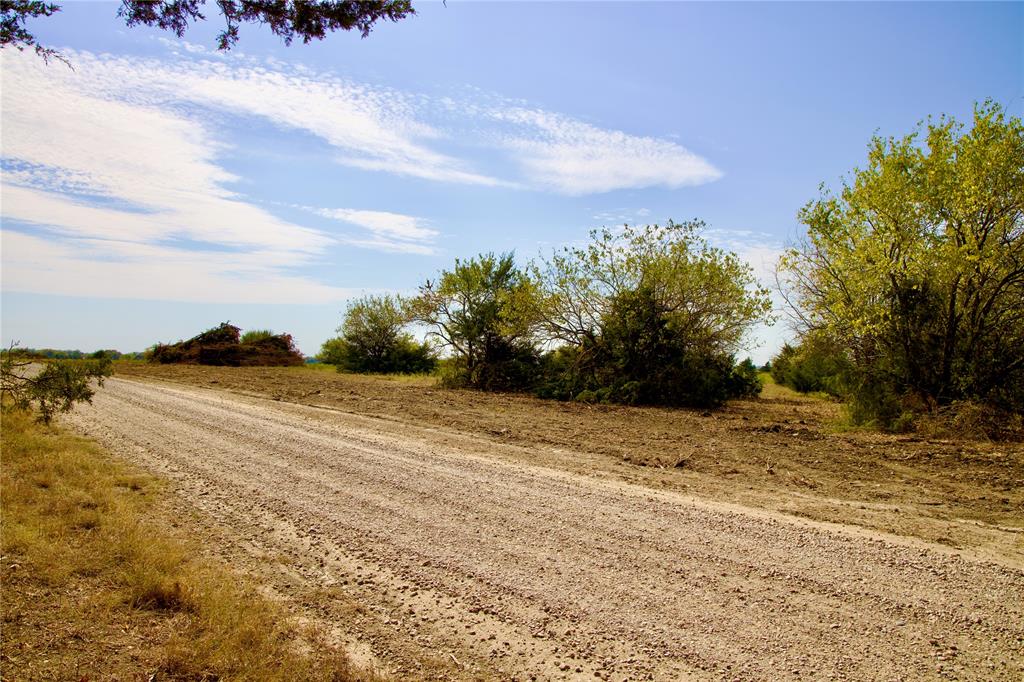 1 County Road 2935 Dodd City, TX 75438 - Photo 11 of 25 a view of a yard with an ocean