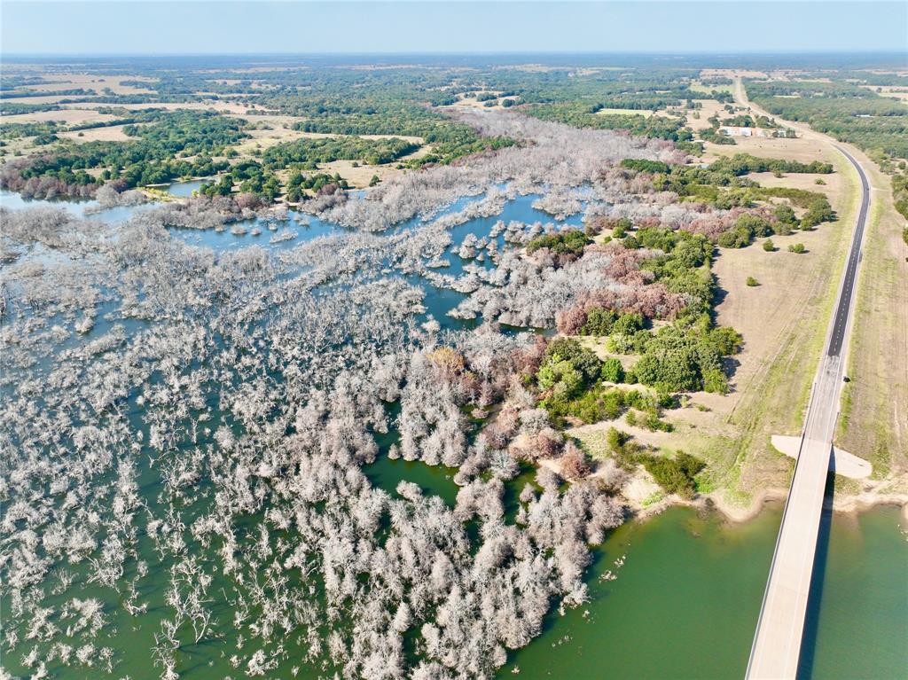 1 County Road 2935 Dodd City, TX 75438 - Photo 23 of 25 a view of a lake with a mountain