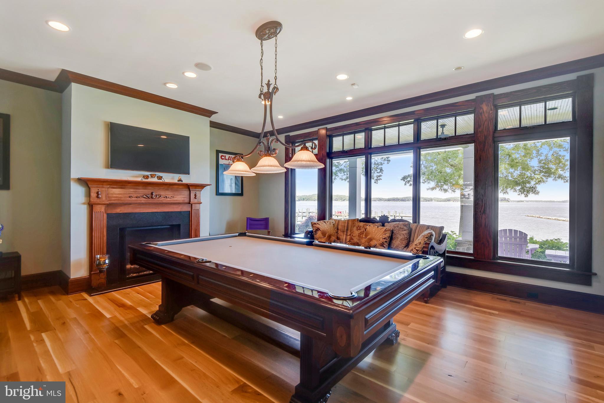 819 Riverside Drive Arnold, MD 21012 - Photo 29 of 75 Billiards Room has a gas fireplace.