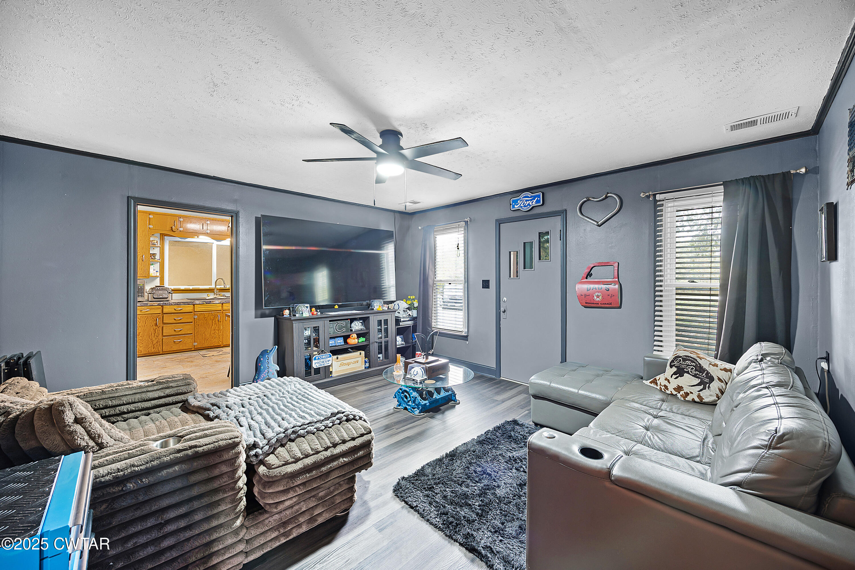 208 Germantown Road Milan, TN 38358 - Photo 3 of 16 a bedroom with two beds and a large window