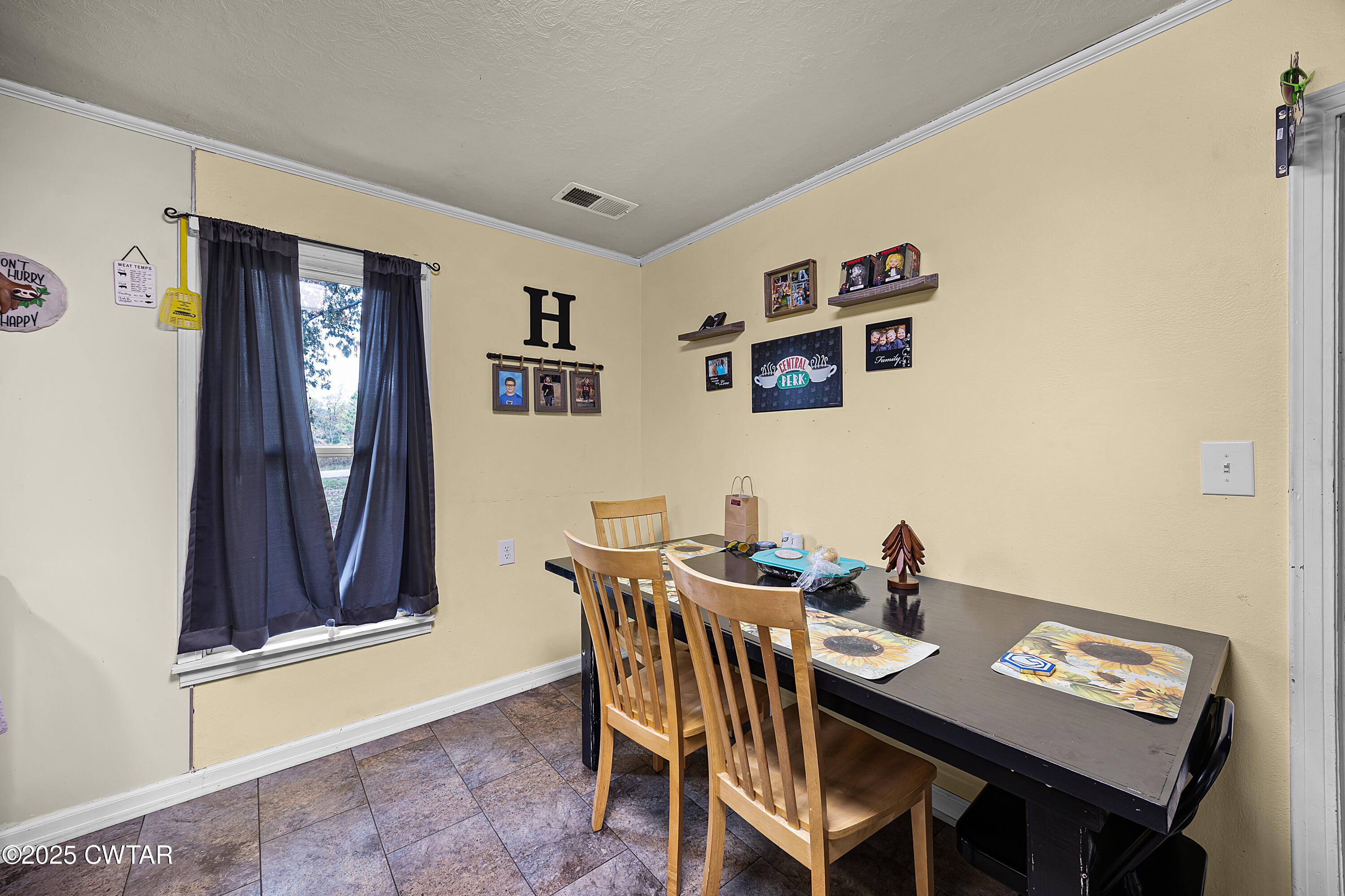 208 Germantown Road Milan, TN 38358 - Photo 7 of 16 a view of a dining room with furniture