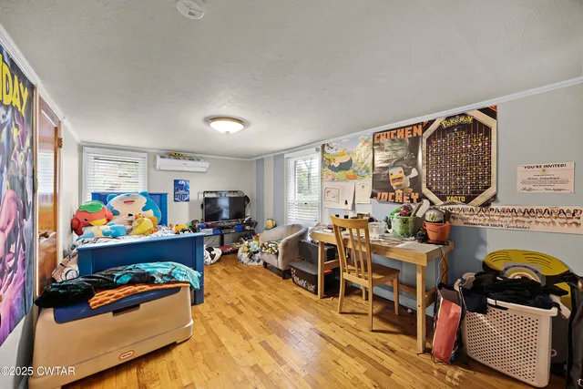 a living room with lots of furniture and toys