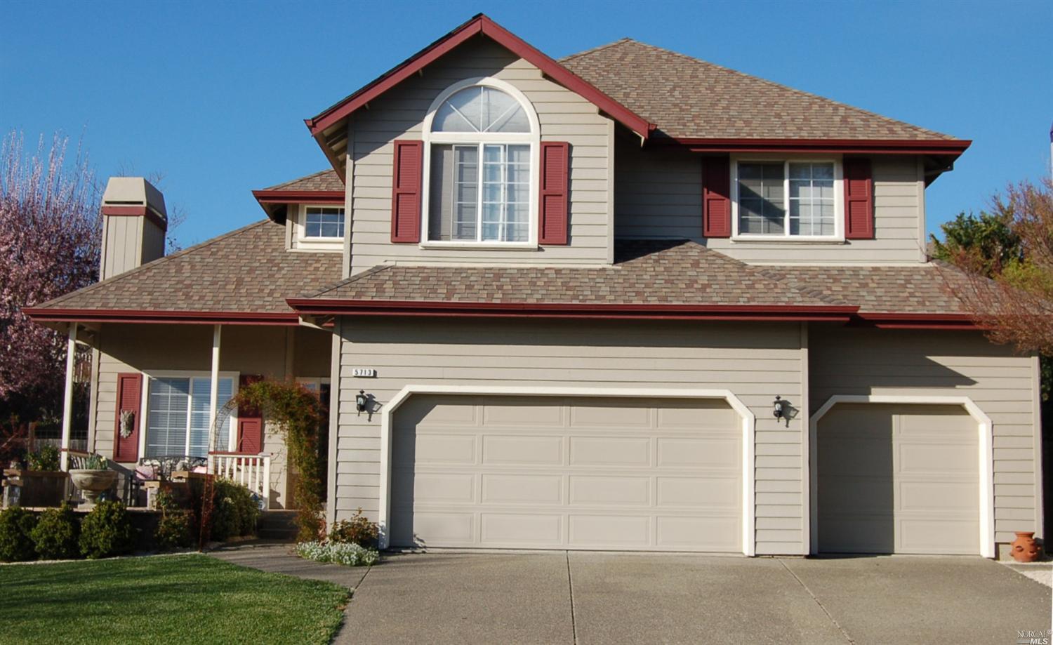 5713 Evening Way Santa Rosa, CA 95409 - Photo 1 of 1 a front view of a house with a yard