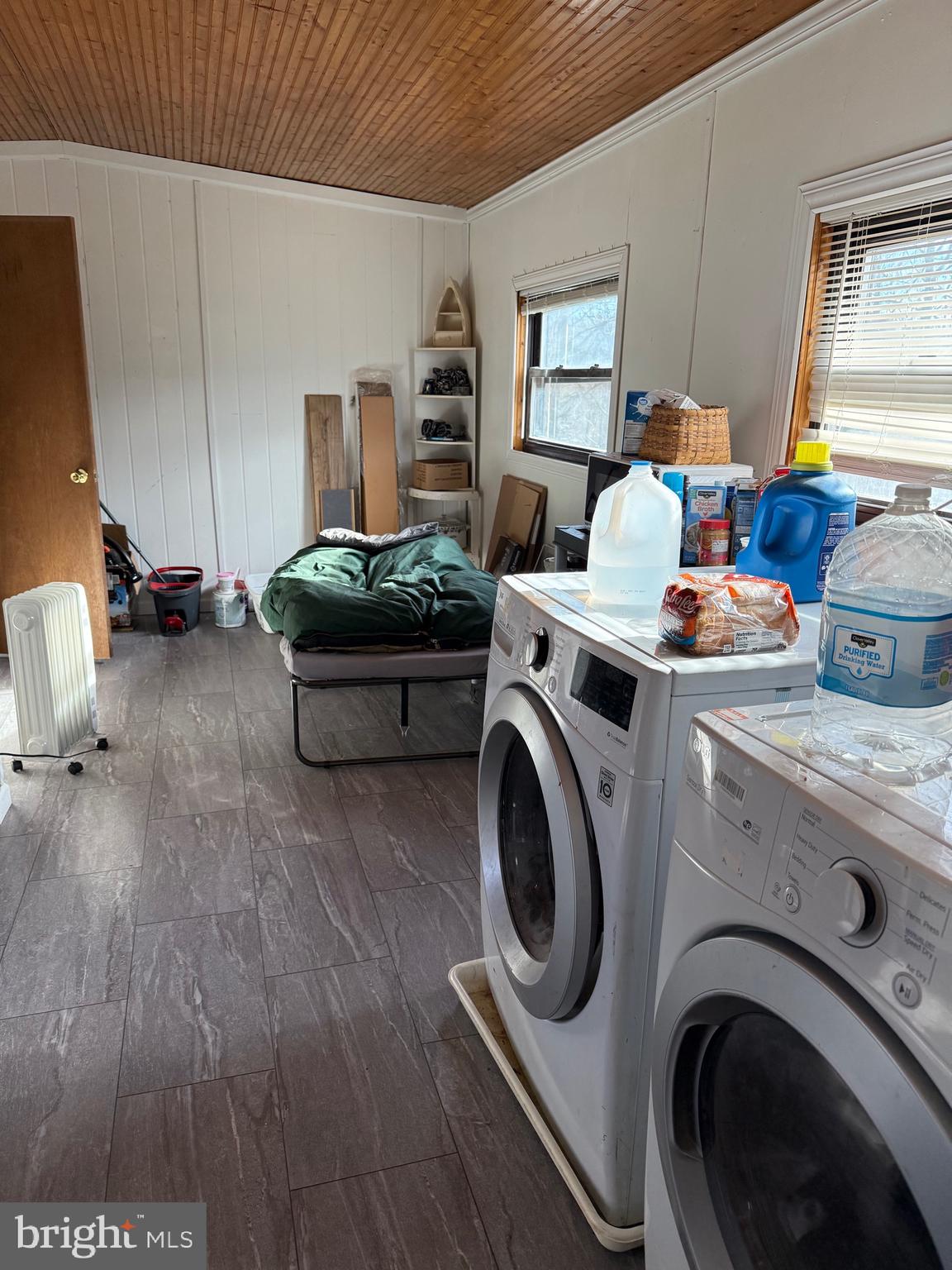 692 Plum Tree Lane Berkeley Springs, WV 25411 - Photo 3 of 14 a living room with furniture and a wooden floor