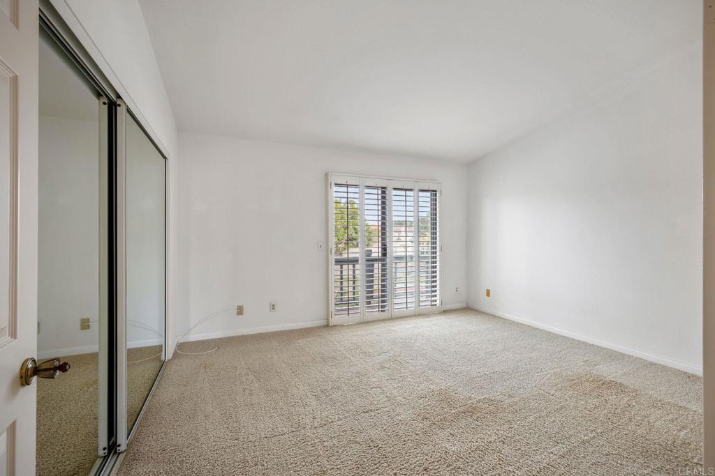6882 Batiquitos Drive Carlsbad, CA 92011 - Photo 18 of 47 a view of an empty room with a window