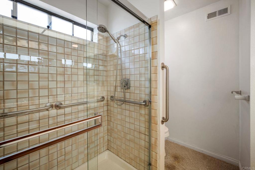 6882 Batiquitos Drive Carlsbad, CA 92011 - Photo 21 of 47 a bathroom with a shower