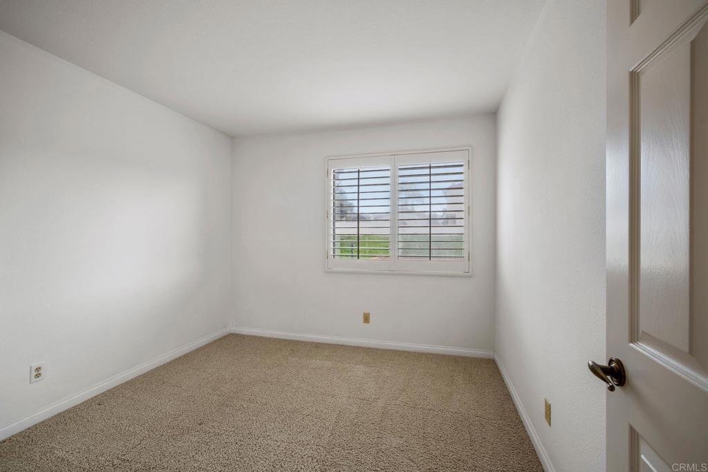 6882 Batiquitos Drive Carlsbad, CA 92011 - Photo 23 of 47 an empty room with a window