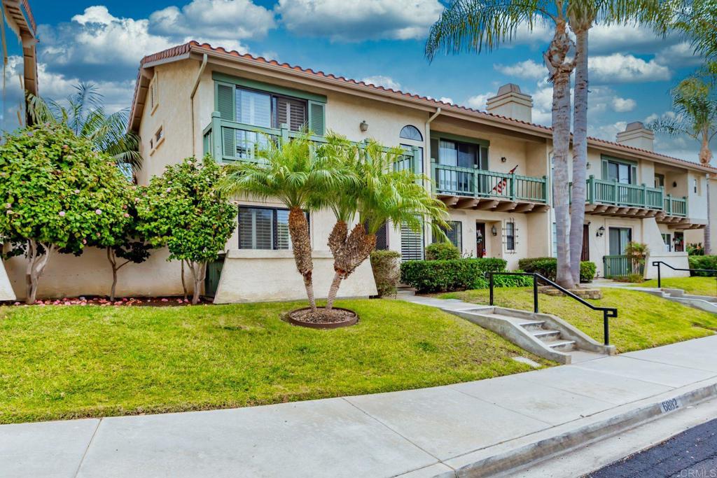 6882 Batiquitos Drive Carlsbad, CA 92011 - Photo 34 of 47 a view of a house with a yard and plants