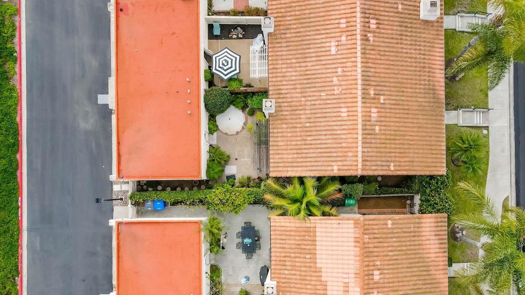 6882 Batiquitos Drive Carlsbad, CA 92011 - Photo 38 of 47 a front view of a house with a yard and garage
