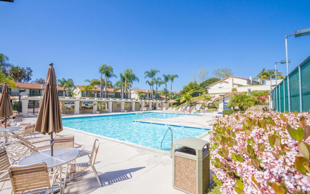 6882 Batiquitos Drive Carlsbad, CA 92011 - Photo 44 of 47 a view of a swimming pool with an outdoor seating
