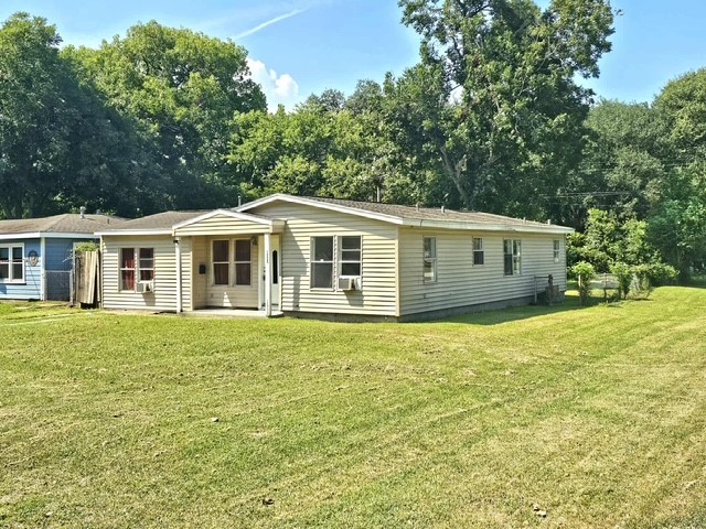 a house view with a garden space