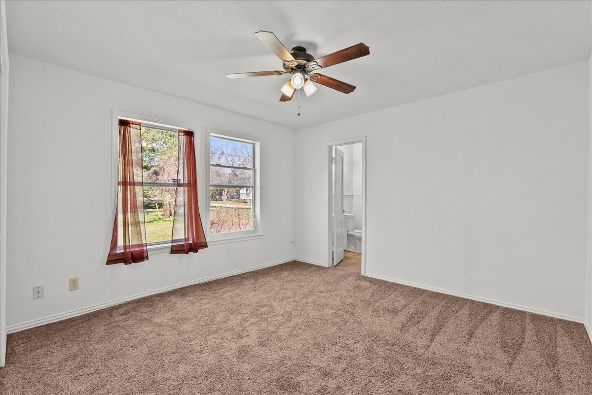 1002 Orange Street La Marque, TX 77568 - Photo 14 of 31 a view of an empty room with a window