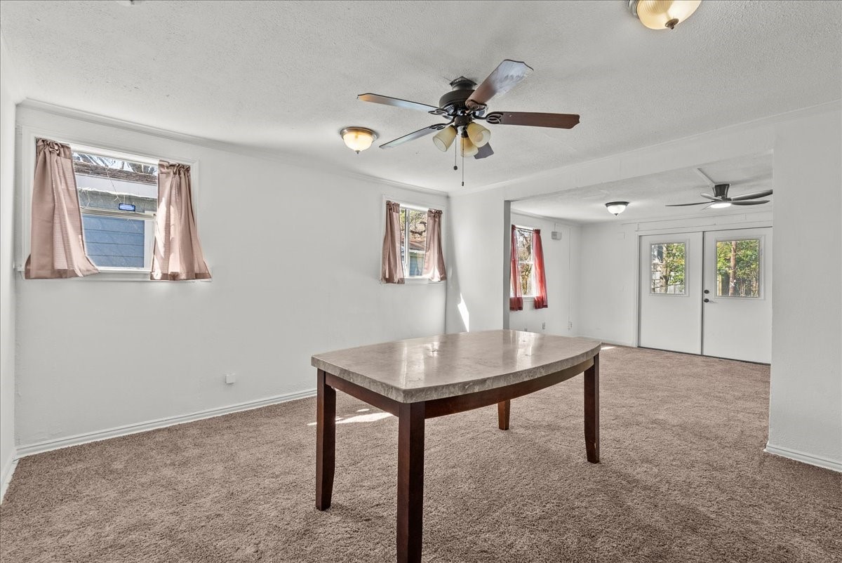 1002 Orange Street La Marque, TX 77568 - Photo 18 of 31 a view of a workspace with furniture