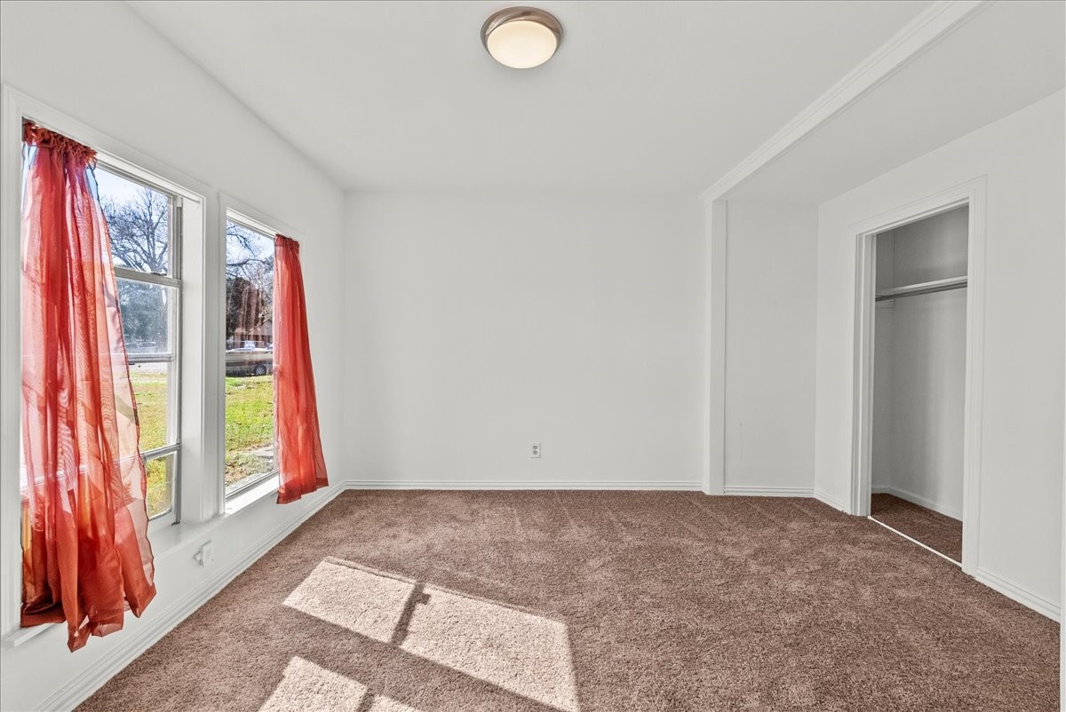 1002 Orange Street La Marque, TX 77568 - Photo 21 of 31 a view of an empty room and window