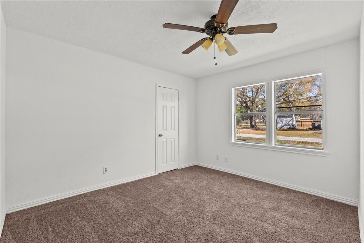 1002 Orange Street La Marque, TX 77568 - Photo 26 of 31 a view of an empty room with a window