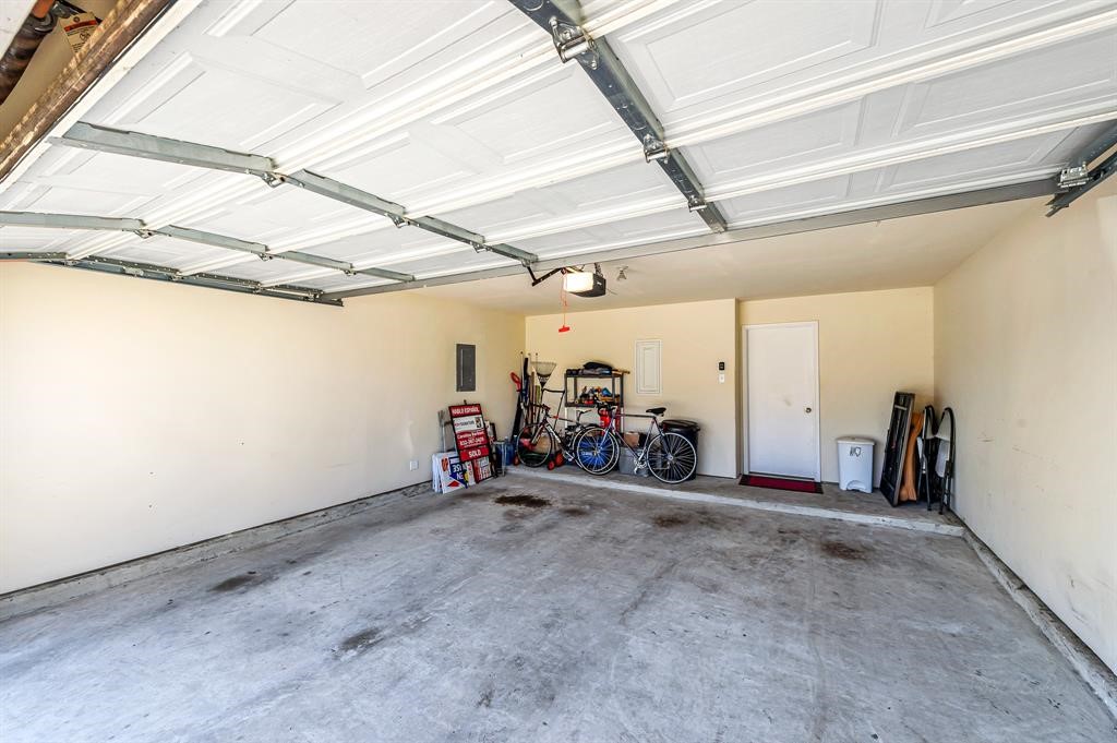 3203 Dale Ridge Trail Houston, TX 77084 - Photo 33 of 33 Clean and spacious interior view of the attached two-car garage with extra room for storage.