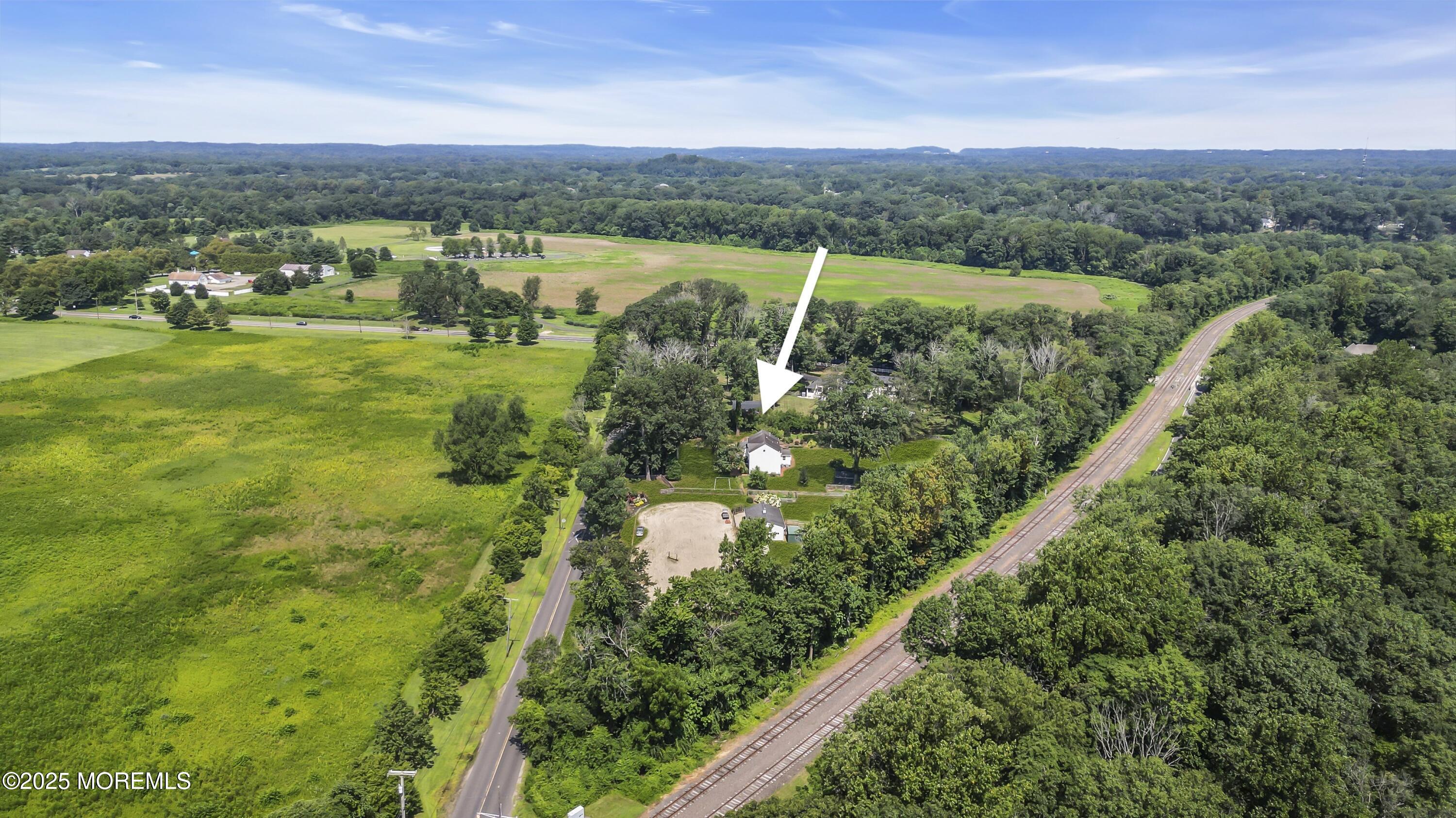 39 Hockhockson Road Colts Neck, NJ 07722 - Photo 2 of 72 a view of a city with mountains in the background