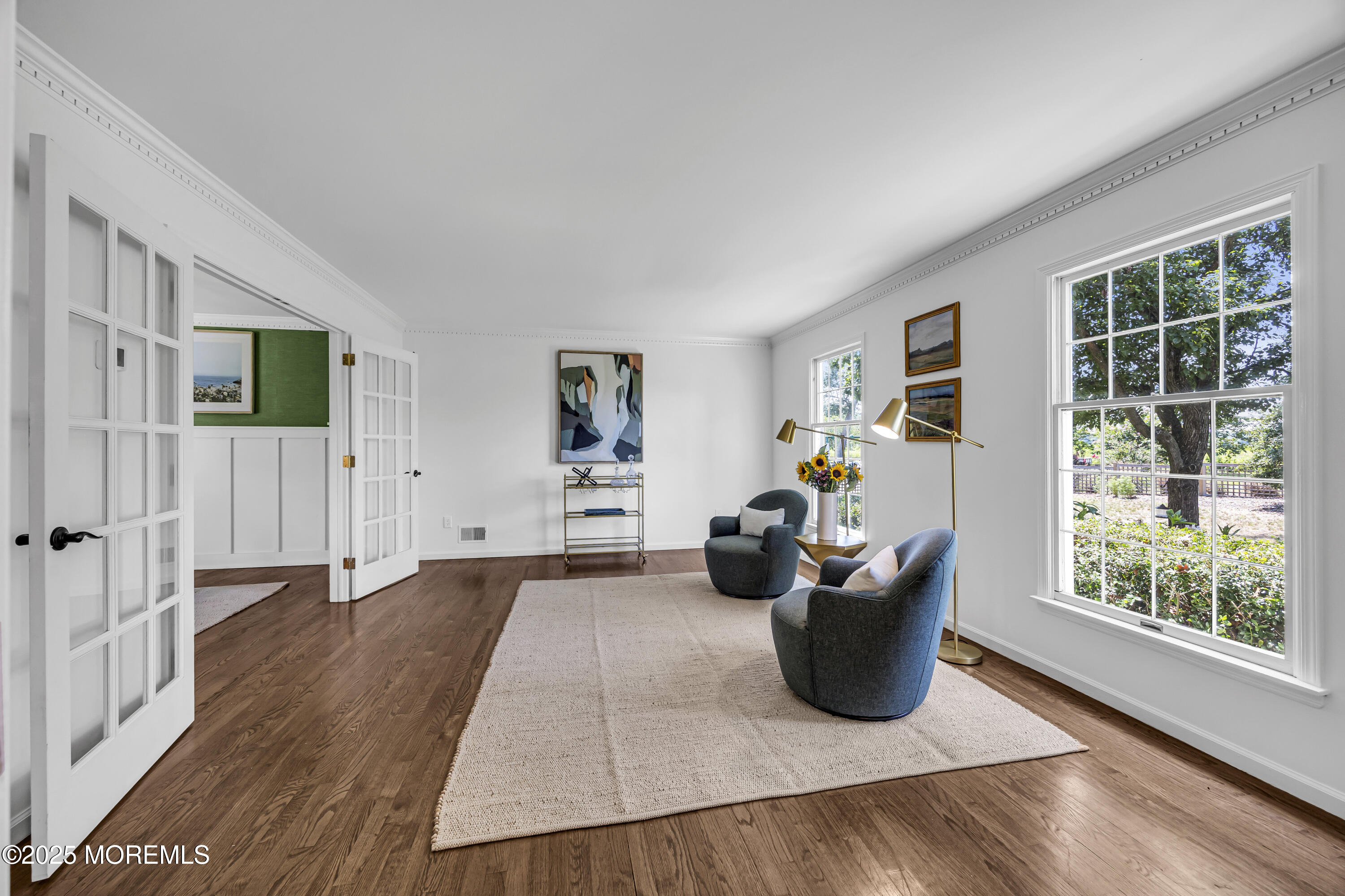 39 Hockhockson Road Colts Neck, NJ 07722 - Photo 22 of 72 a living room with furniture and a window