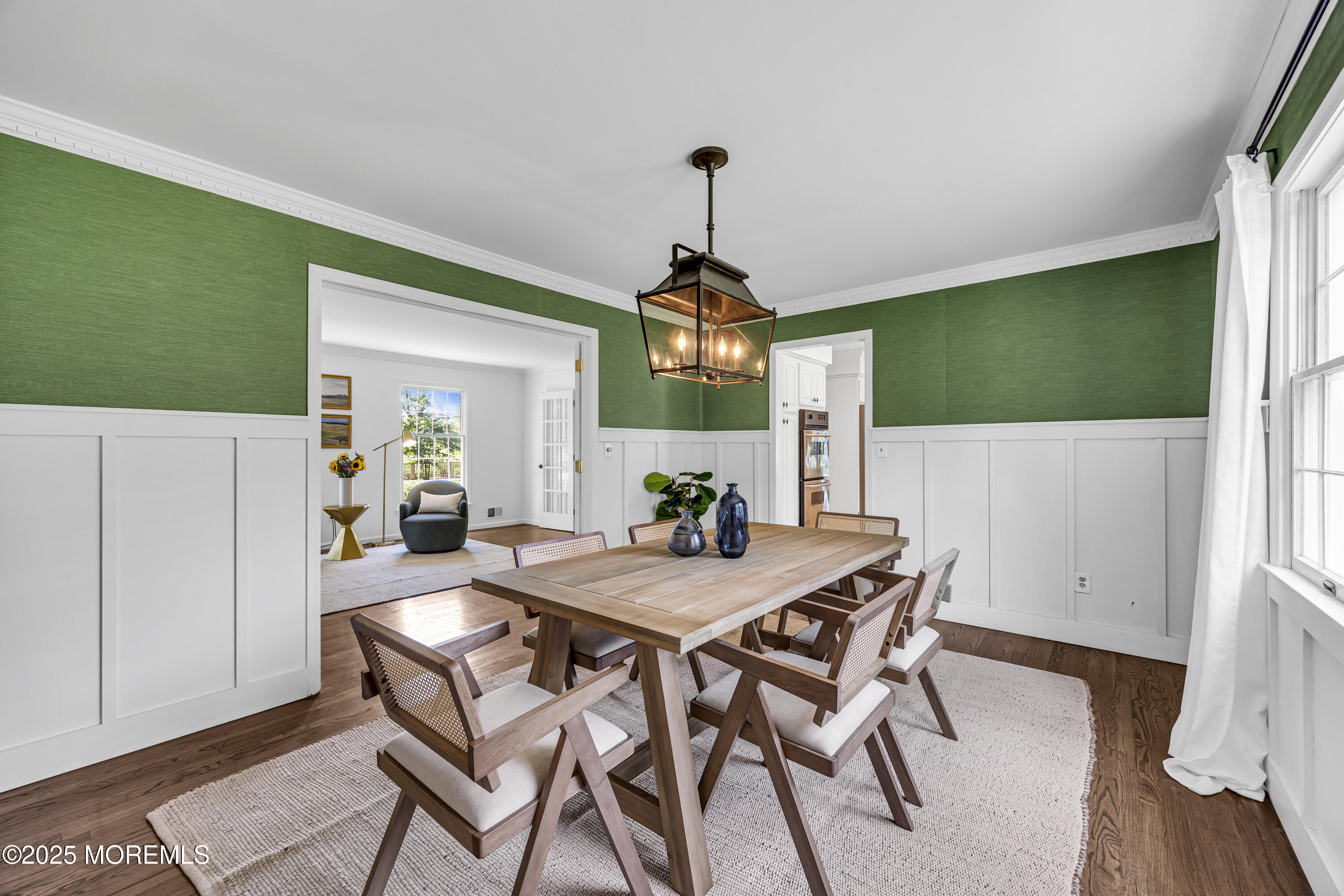 39 Hockhockson Road Colts Neck, NJ 07722 - Photo 27 of 72 a view of a dining room with furniture and a chandelier