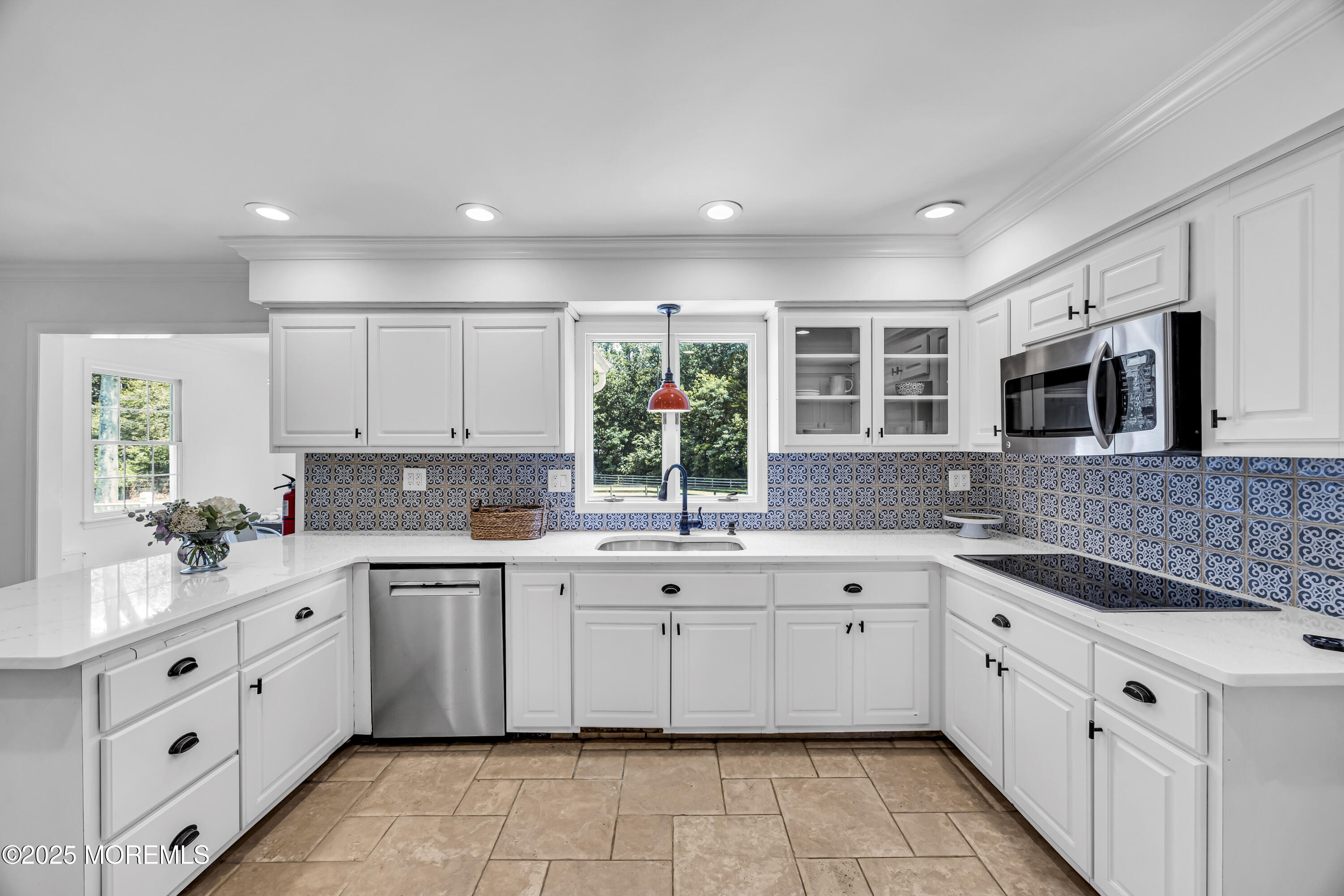 39 Hockhockson Road Colts Neck, NJ 07722 - Photo 28 of 72 a kitchen with a sink stove and cabinets