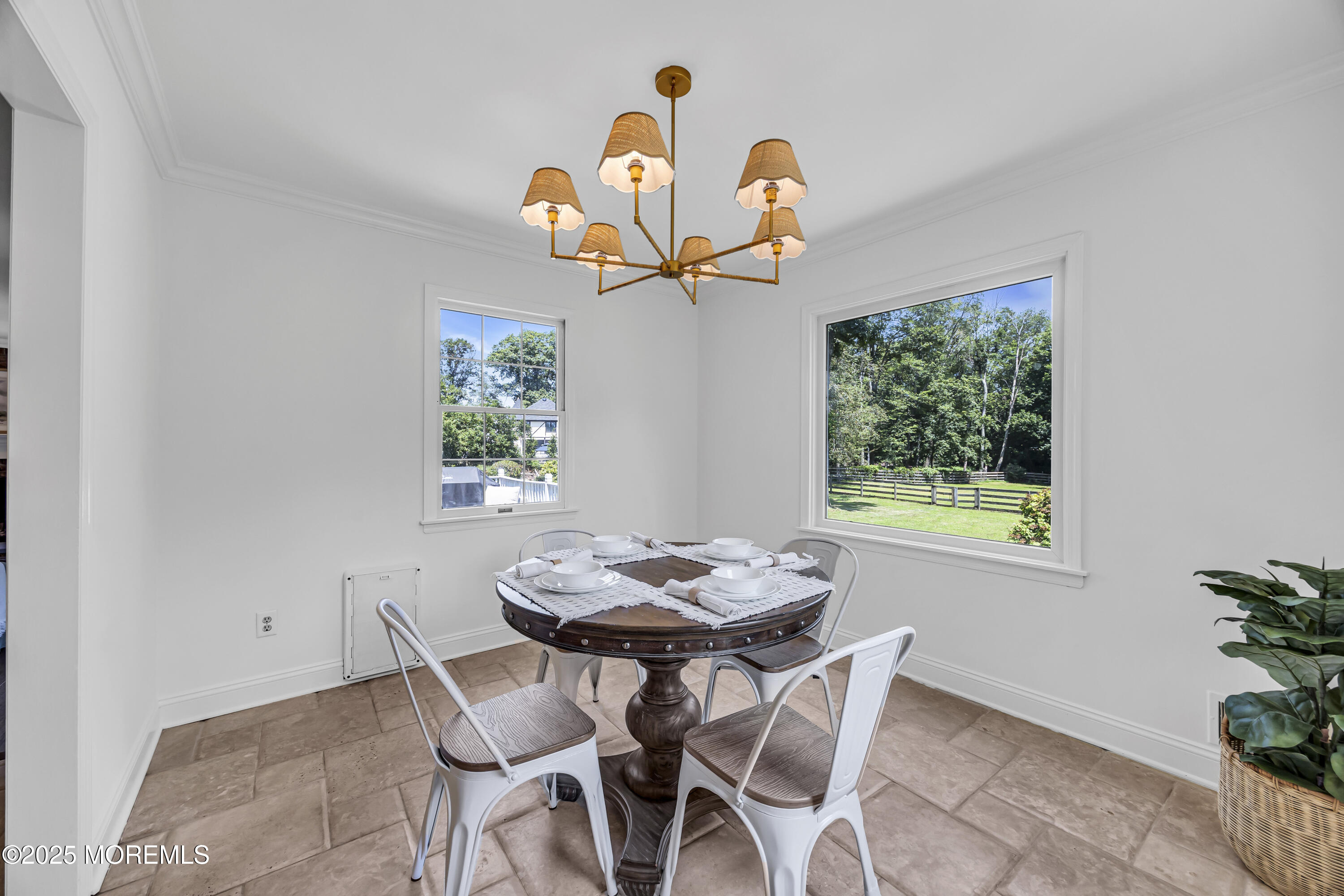 39 Hockhockson Road Colts Neck, NJ 07722 - Photo 31 of 72 a view of a dining room with furniture window and outside view