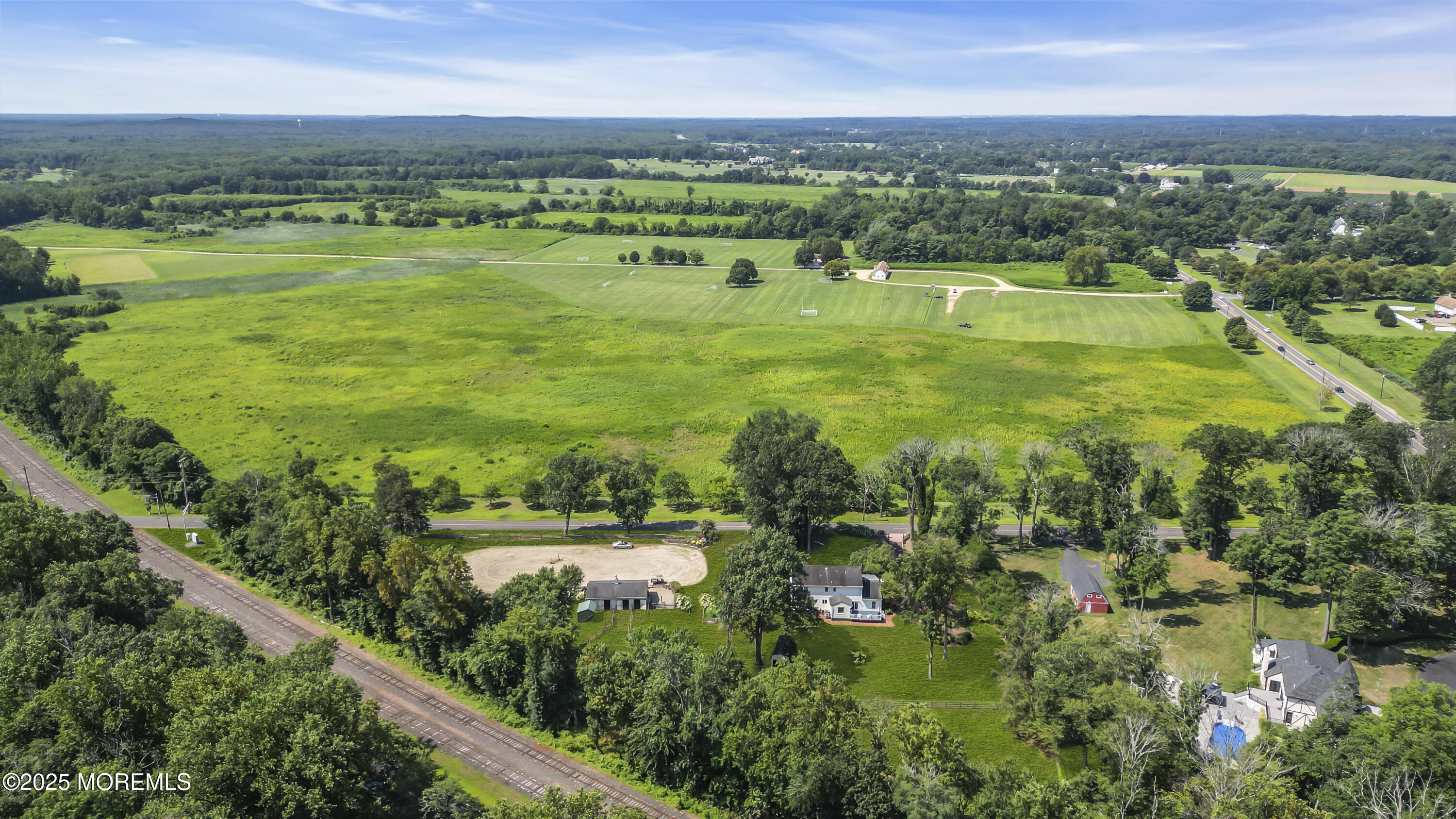 39 Hockhockson Road Colts Neck, NJ 07722 - Photo 4 of 72 a view of a city with lots of residential buildings ocean and mountain view