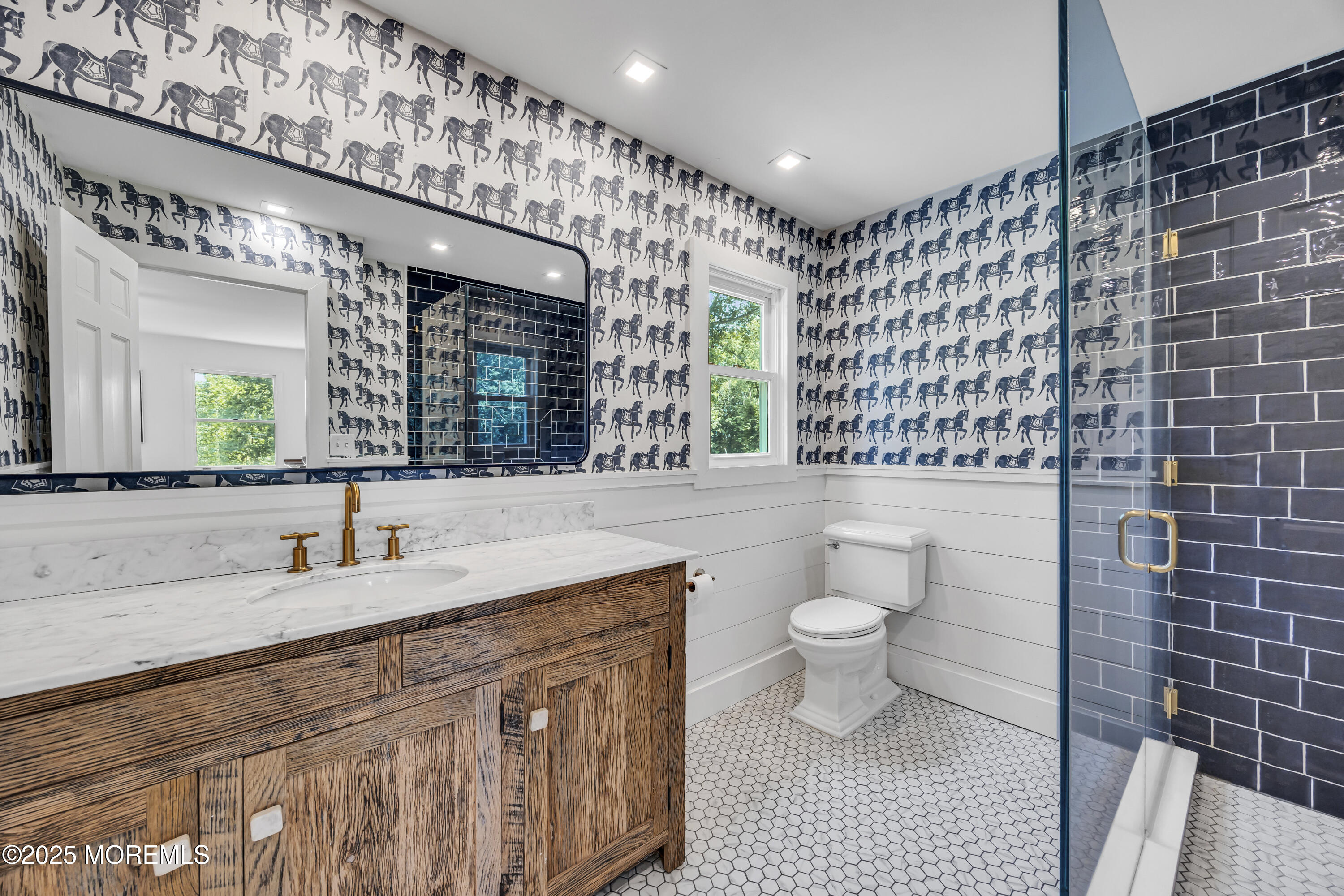 39 Hockhockson Road Colts Neck, NJ 07722 - Photo 47 of 72 a bathroom with a sink a toilet and a mirror