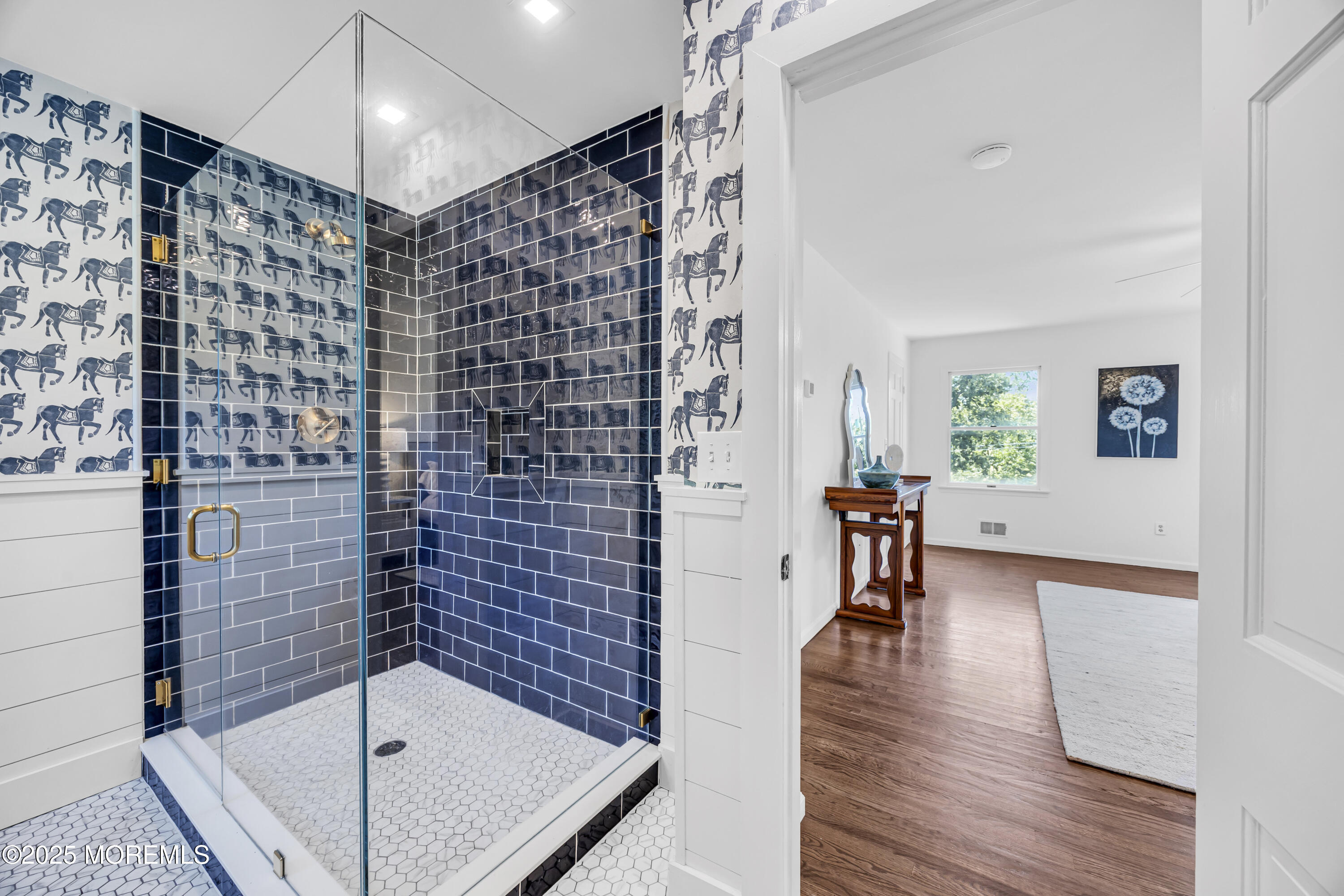 39 Hockhockson Road Colts Neck, NJ 07722 - Photo 48 of 72 a bathroom with a bathtub and a shower