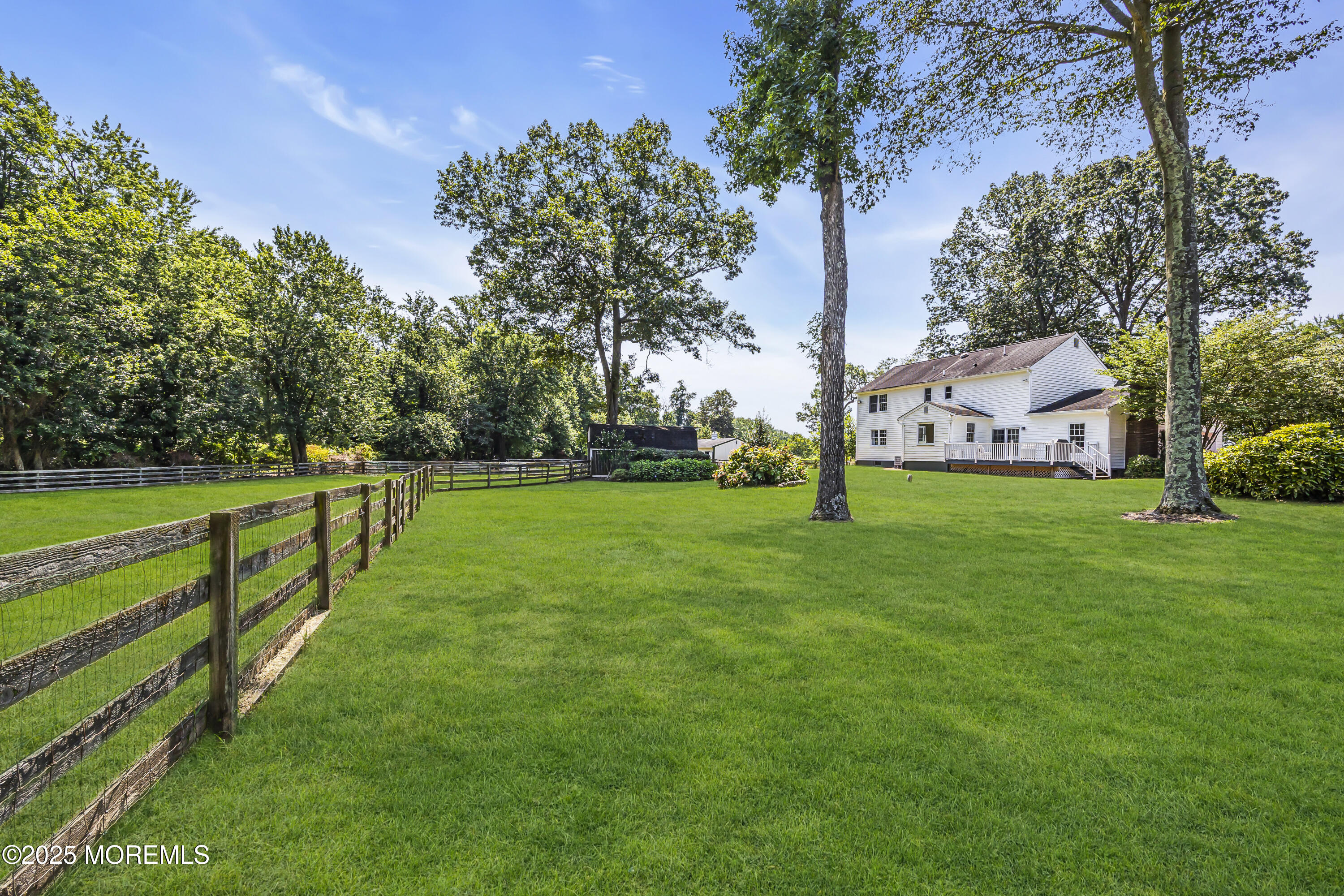 39 Hockhockson Road Colts Neck, NJ 07722 - Photo 53 of 72 a view of a house with a big yard