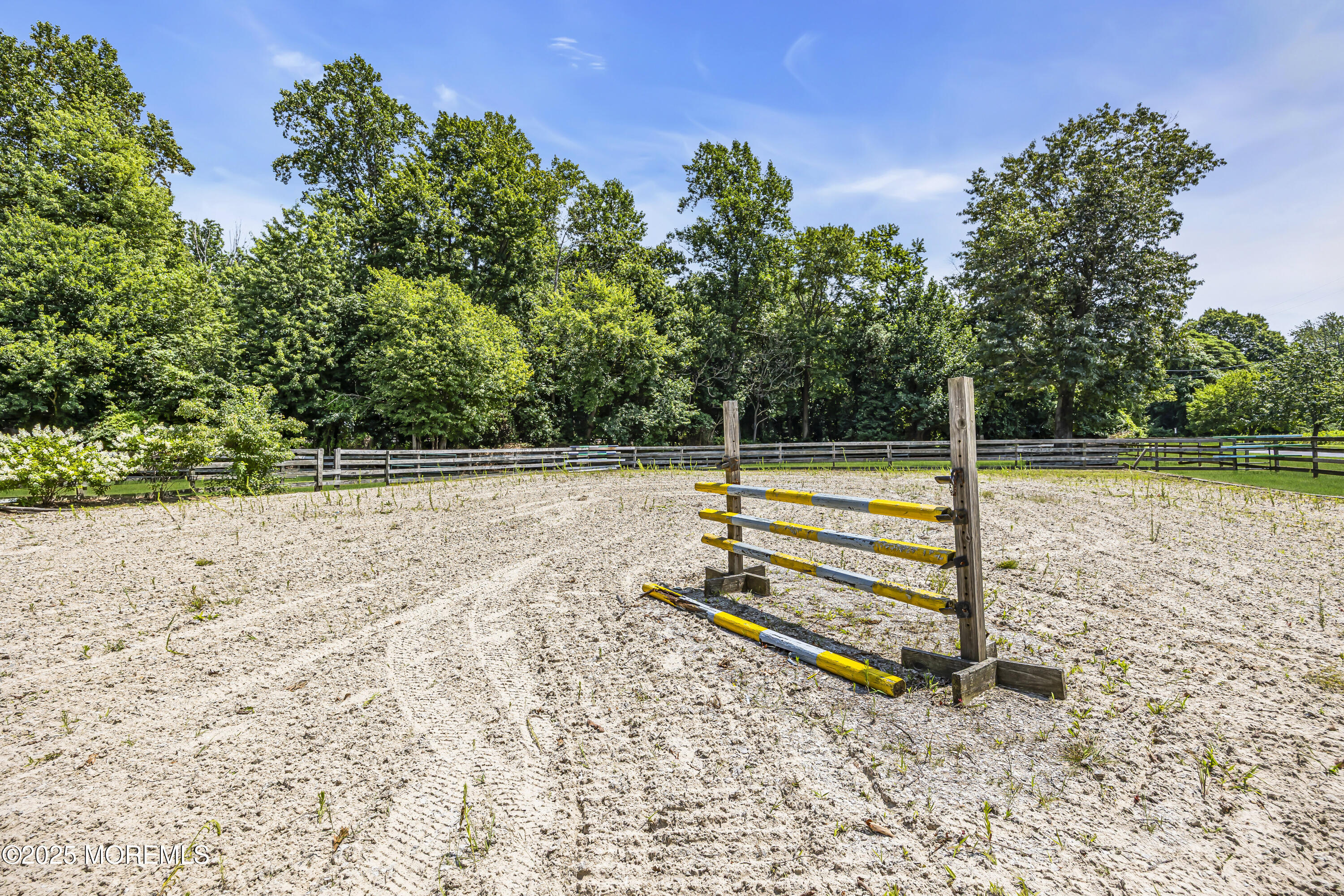39 Hockhockson Road Colts Neck, NJ 07722 - Photo 57 of 72 a view of a bench in a backyard