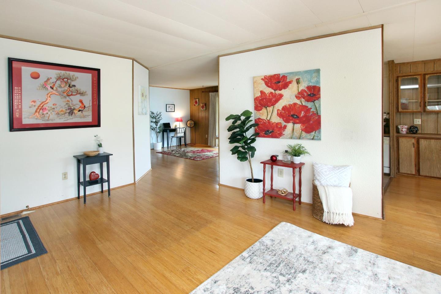 800 Dolan Road, Unit 22 Moss Landing, CA 95039 - Photo 5 of 29 a living room with furniture and wooden floor
