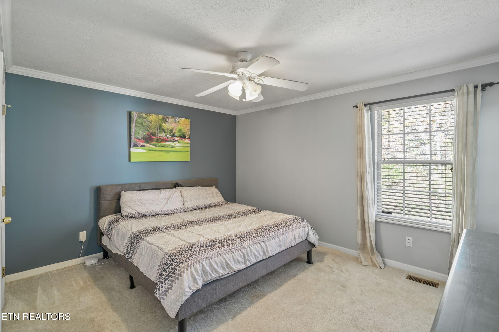 172 Edgewood Drive Powell, TN 37849 - Photo 16 of 29 a bedroom with a bed and a window