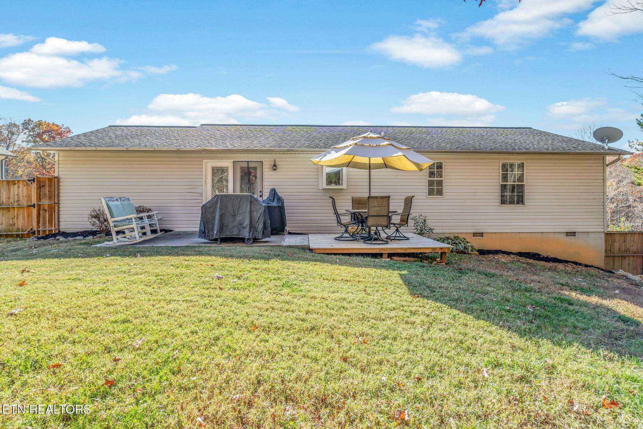 172 Edgewood Drive Powell, TN 37849 - Photo 24 of 29 a front view of house with yard seating and patio
