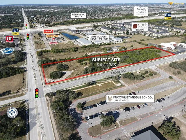 a street sign that is on a tree