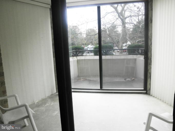 15100 Interlachen Drive, Unit 4111 Silver Spring, MD 20906 - Photo 8 of 28 Glass Enclosed Sunroom Plus Outdoor Balcony