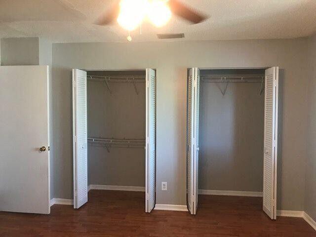 3405 Poolside Drive Greenacres, FL 33463 - Photo 14 of 32 an empty room with closet area