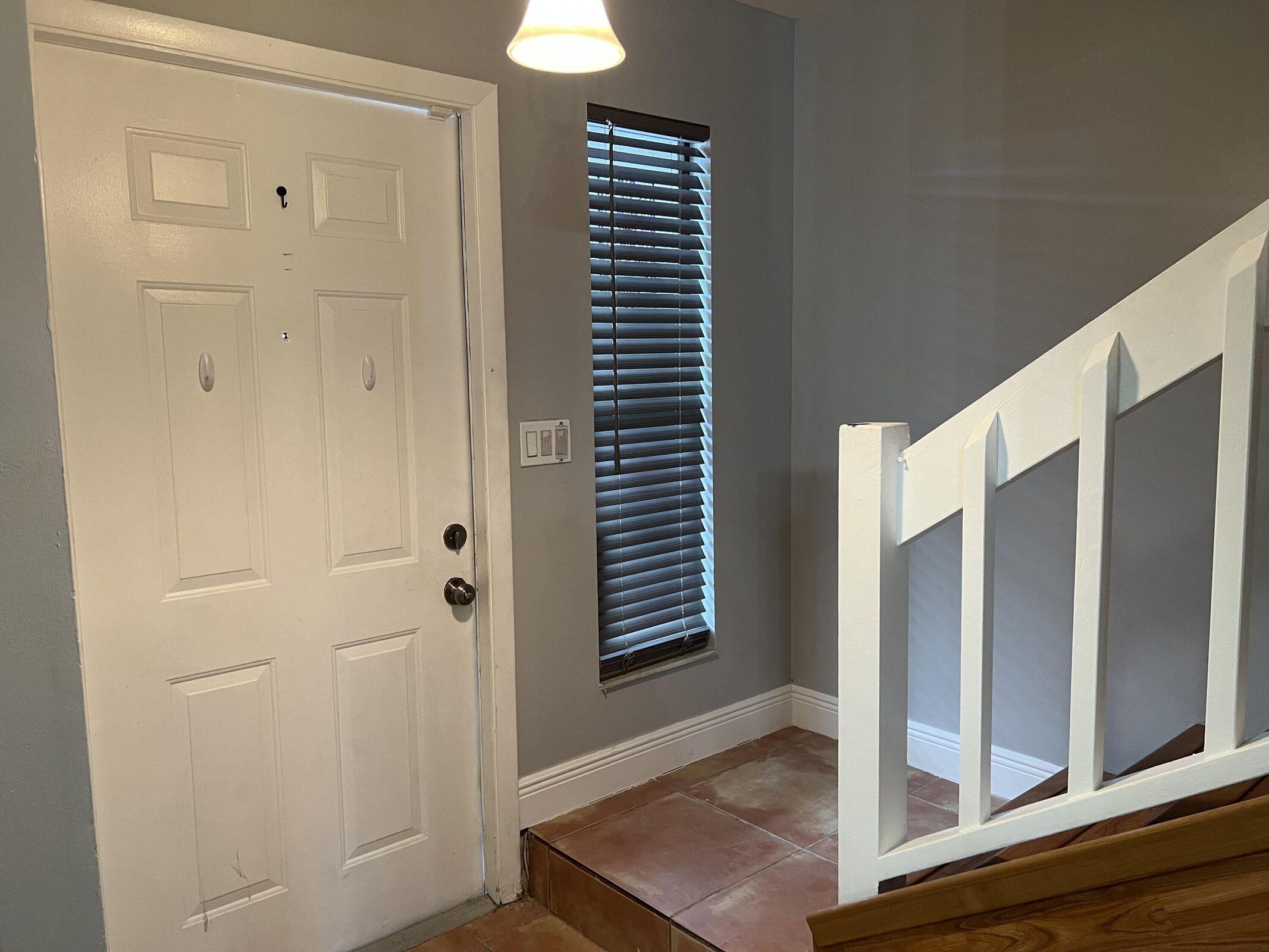 3405 Poolside Drive Greenacres, FL 33463 - Photo 22 of 32 a view of elevator with hallway