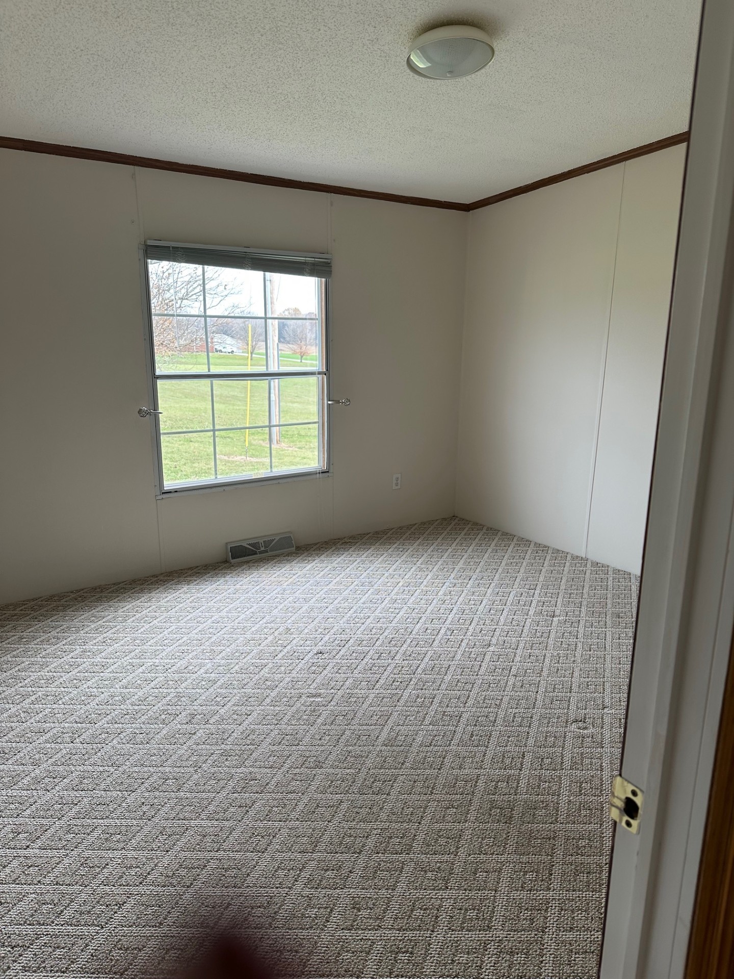 6448 Payne Road Portland, TN 37148 - Photo 16 of 28 an empty room with a window