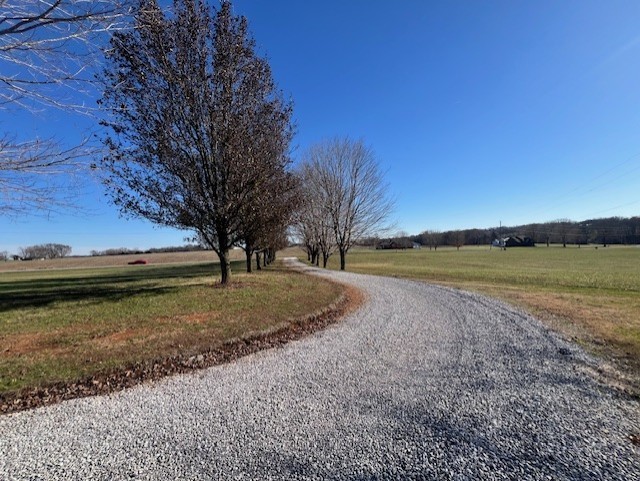 6448 Payne Road Portland, TN 37148 - Photo 24 of 28 a view of a lake with a yard
