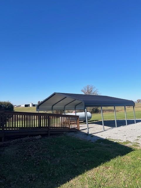 6448 Payne Road Portland, TN 37148 - Photo 28 of 28 a view of a chairs and table in the backyard